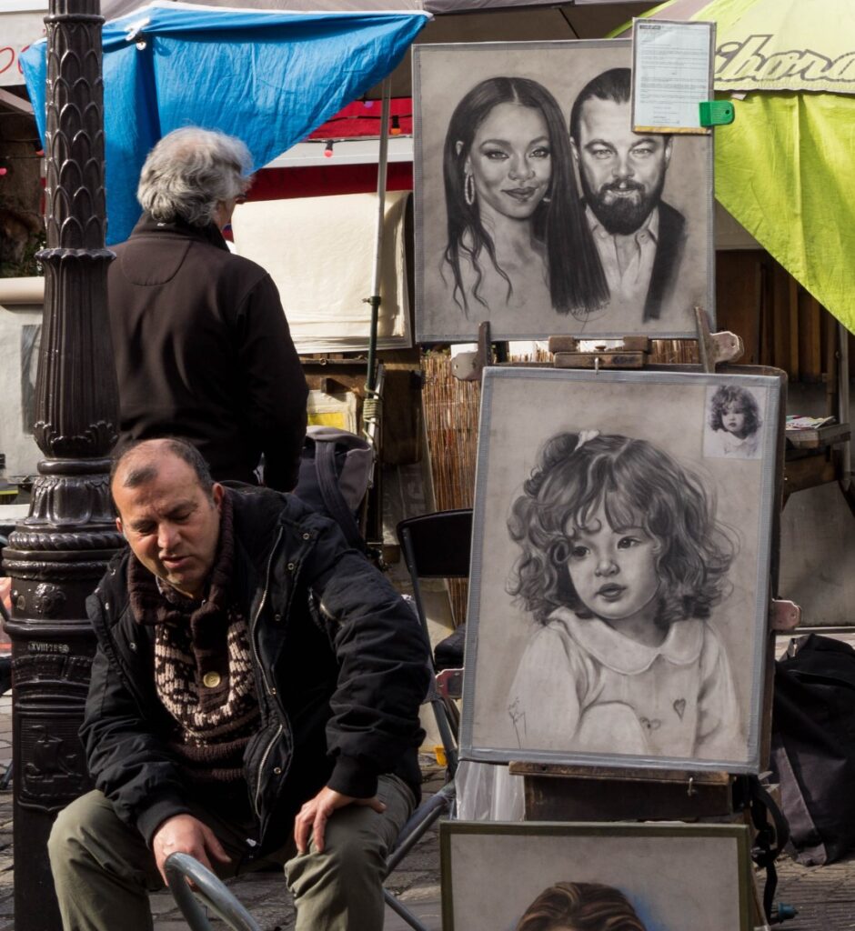 place du tertre painter with artwork